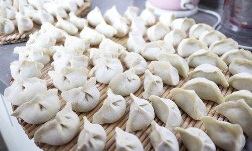 冬至吃饺子的由来,冬至吃饺子的由来是什么图3